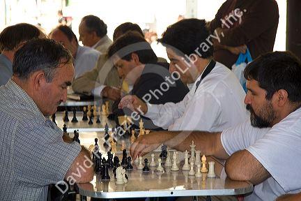 Chilean men play chess in the Plaza de Armas in Santiago, Chile.