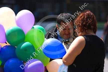Street vendor selling balloons in the Plaza de Armas in Santiago, Chile.