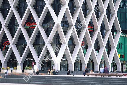 Lattice exterior of shops at the Arche de la Defense in Paris, France.