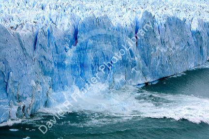Ice breaking off the face of the Perito Moreno Glacier located in the Los Glaciares National Park in the south west of Santa Cruz province, Patagonia, Argentina.