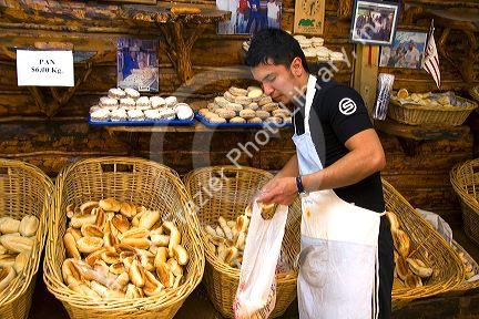 Young man working at the Panaderia Union bakery in Tolhuin, Tierra del Fuego, Argentina.