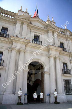 Guards stand at the Palacio de la Moneda in Santiago, Chile.
