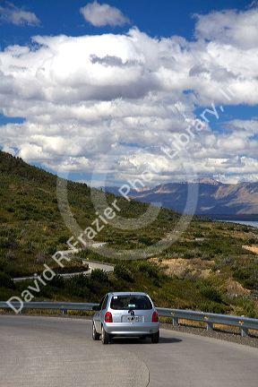 Car drives on a highway along Lake Argentino near El Calafate, Patagonia, Argentina.