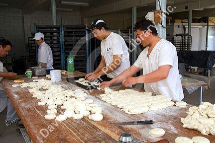 Bakers make biscuits at the Panaderia Union in Tolhuin, Tierra del Fuego, Argentina.
