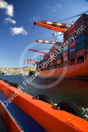 Shipping containers and cranes at the Port of Valparaiso, Chile.