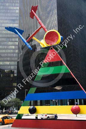 Public art sculpture named Personage and Birds by Joan Miro in front of the JP Morgan Chase Tower in downtown Houston, Texas.
