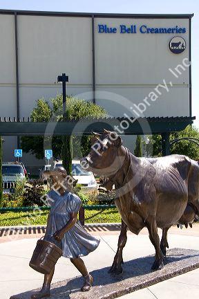 Sculpture of the Blue Bell Cow and Girl by Veryl Goodnight in front of the Blue Bell Creamery in Brenham, Texas.