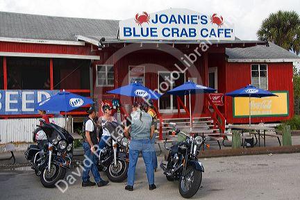 Bikers in front of Joanie's Blue Crab Cafe along the Tamiami Trail on U.S. Highway 41 in the Florida Everglades.