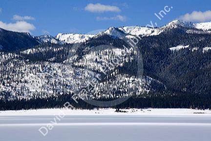 Cascade Lake covered in ice and snow in Cascade, Idaho.