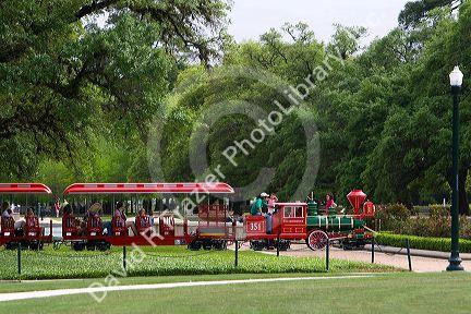 Small train gives visitors a tour of Hermann Park in Houston, Texas.