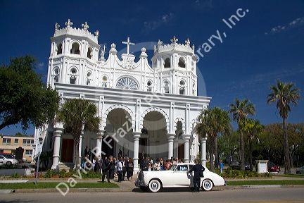 Wedding party outside the Sacred Heart Church in Galveston, Texas.