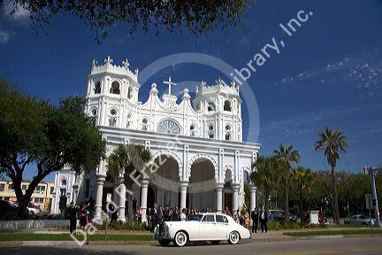Wedding party outside the Sacred Heart Church in Galveston, Texas.