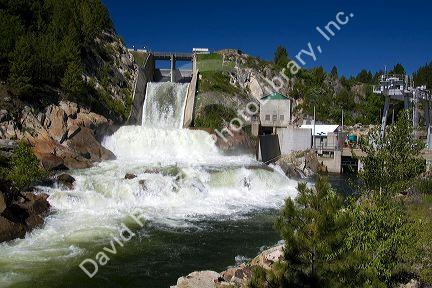 Water pouring from the outlet of Cascade Dam on Cascade Reservior flowing into the Payette River in Valley County, Idaho.