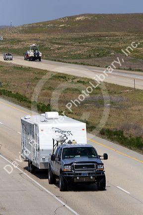 Truck hauling a camper on Interstate 84 west near Boise, Idaho.
