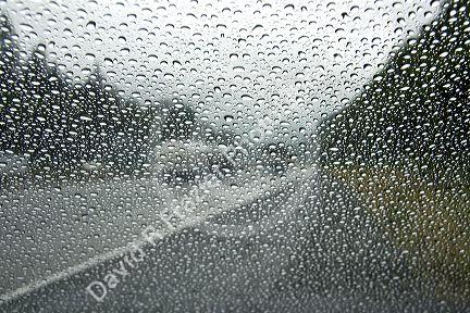 Raindrops on the windshield of car in Washington.