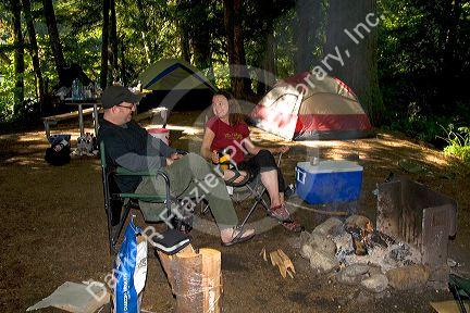 Campers sit next to a campfire in the North Cascades National Park, Washington.