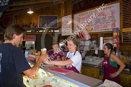 Teenage girls work in an ice cream shop at Winthrop, Washington.