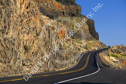 Basalt rock cliffs along the highway near Soap Lake, Washington.