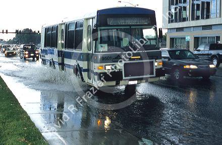 A city bus driving through the flooded streets of Boise, Idaho.