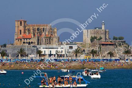 Gothic style church of Santa Maria and castle lighthouse in the harbor at Castro Urdiales, Cantabria, northern Spain.