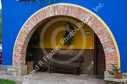 Arched entrance to a residential home in the town of Cangas de Onis, Asturias, northern Spain.