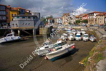 Low tide in the harbor at Llanes, Asturias, Spain.