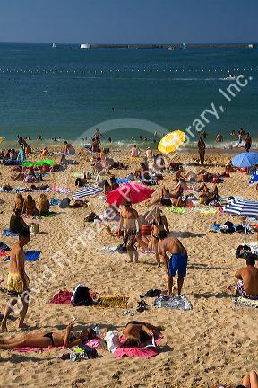 Beach scene in the bay at Saint-Jean-de-Luz, Pyrenees Atlantiques, French Basque Country, Southwest France.