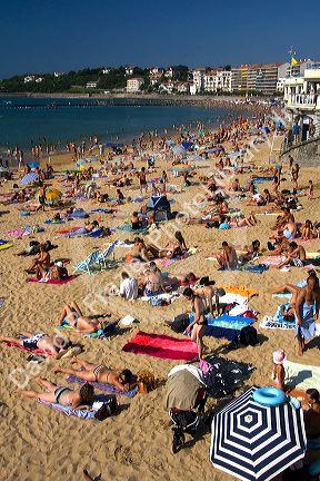 Beach scene in the bay at Saint-Jean-de-Luz, Pyrenees Atlantiques, French Basque Country, Southwest France.