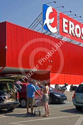 Customers outside the Eroski supermarket in the town of Castro Urdiales, Cantabria, northern Spain.