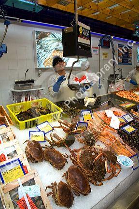 Seafood counter inside the Eroski supermarket in the town of Castro Urdiales, Cantabria, northern Spain.