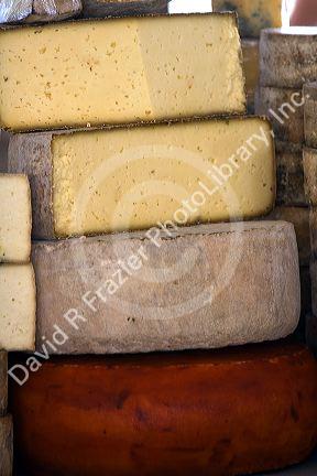 Cheese being sold at an outdoor market in the town of Cangas de Onis, Asturias, northern Spain.