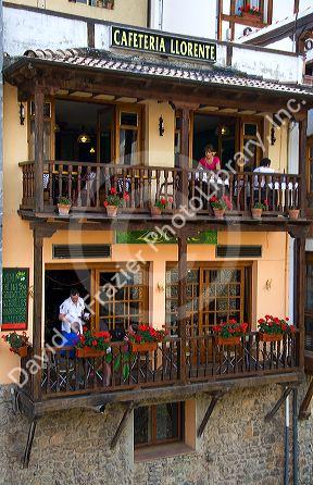 People dine on balconies of a restaurant in the town of Potes, Liebana, Cantabria, northwestern Spain.