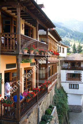 People dine on the balconey of a restaurant in the town of Potes, Liebana, Cantabria, northwestern Spain.