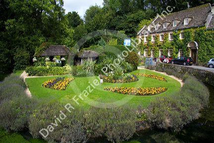 Gardens and trout farm in the village of Bibury, Gloucestershire, England.