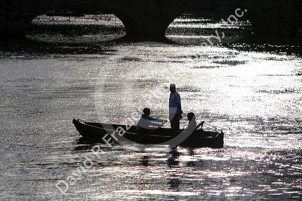 People in a row boat on the River Avon at Stratford-upon-Avon, Warwickshire, England.