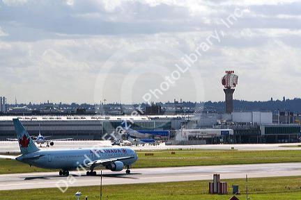 Air Canada airliner on the runway at London Heathrow Airport, England, United Kingdom.