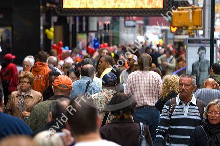 People walking in Times Square, Manhattan, New York City, New York, USA.