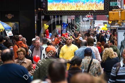 People walking in Times Square, Manhattan, New York City, New York, USA.