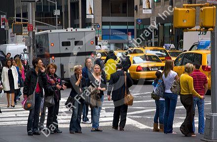 Pedestrians in midtown Manhattan, New York City, New York, USA.