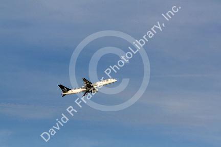 Star Alliance jet airliner taking off from Boston Logan airport, Boston, Massachusetts, USA.