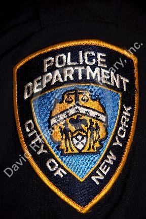 Patch on the arm of a New York City police officer in New York City, New York, USA.
