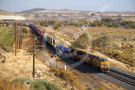 Pacific Union intermodal container train traveling through Elmore County, Idaho, USA.