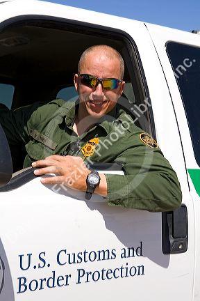 United States Border Patrol agent at the U.S./Mexico border along the All American Canal near Calexico, California