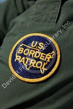 United States Border Patrol patch on an agent at the U.S./Mexico border along the All American Canal near Calexico, California