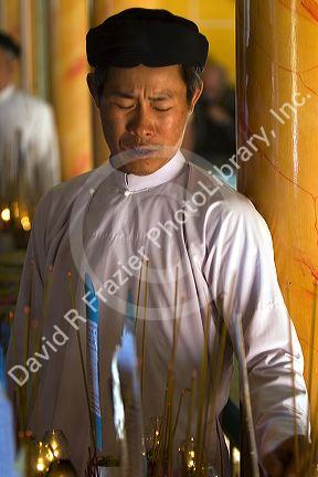 Cao Dai ceremony inside the Tay Ninh Holy See in Tay Ninh, Vietnam.