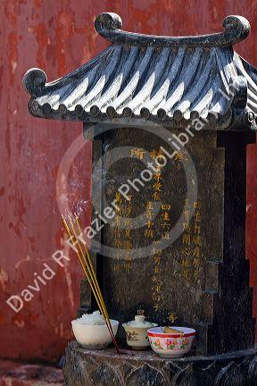 Burning incense outside the Jade Emperor Pagoda Buddhist temple in Ho Chi Minh City, Vietnam.