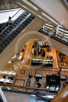 Escalators inside the Diamond Plaza shopping center in downtown Ho Chi Minh City, Vietnam.