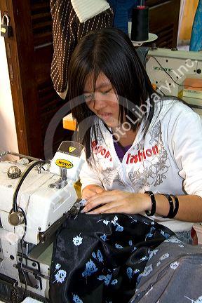 Workers sewing at the Yaly clothing factory in Hoi An, Vietnam.