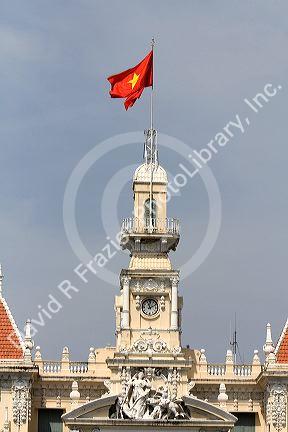 Flag of Vietnam atop the Ho Chi Minh City Hall in Vietnam.