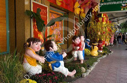 Tet decorations in front of a business in Ho Chi Minh City, Vietnam.